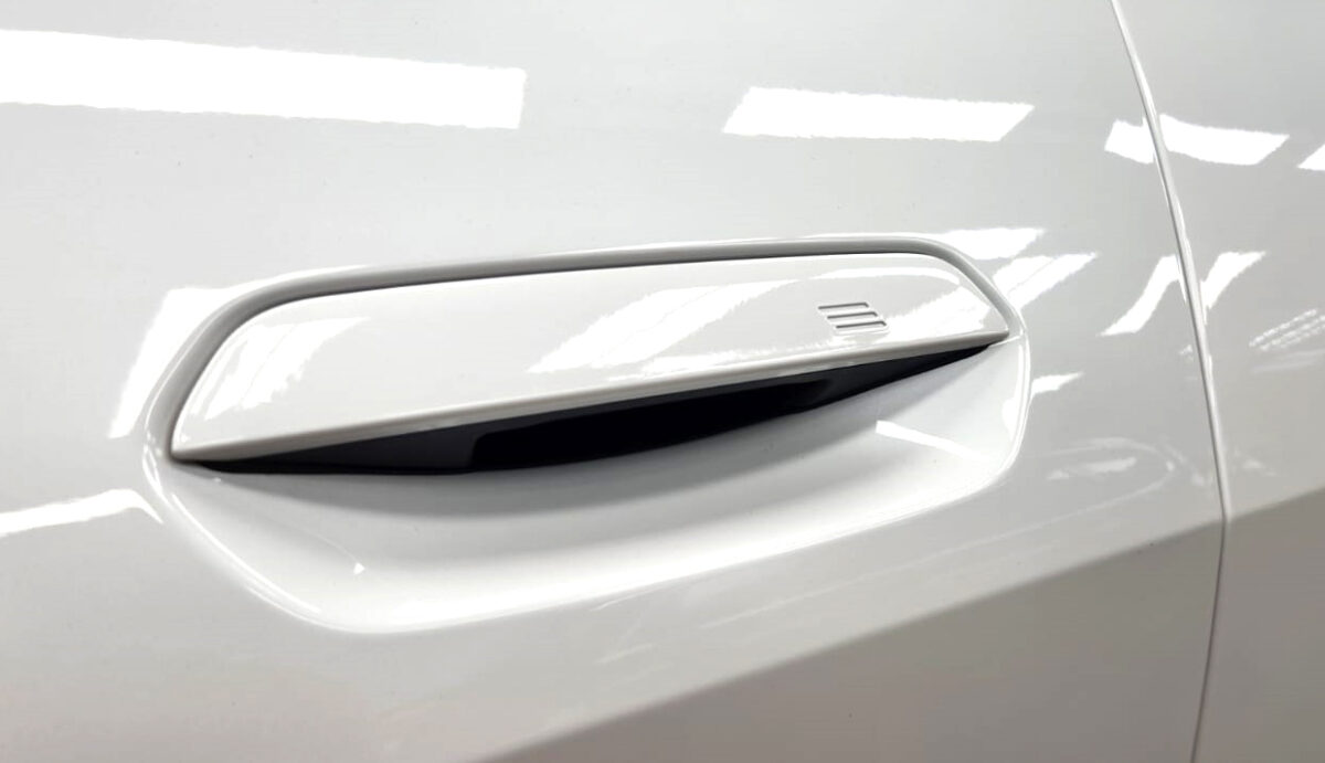 Front three-quarter view of the BMW i4 after coating.