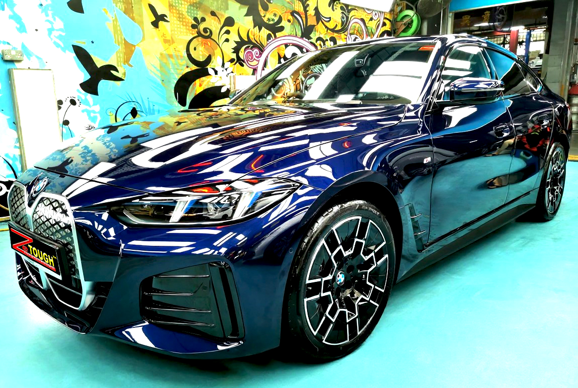 BMW i4, glossy after its ZeTough Titanium coating.