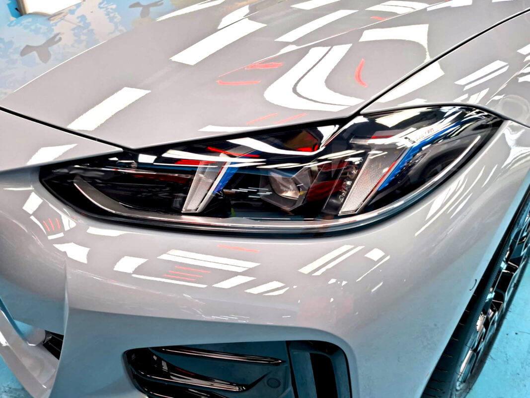 Glossy bodywork of the BMW i4 after coating.