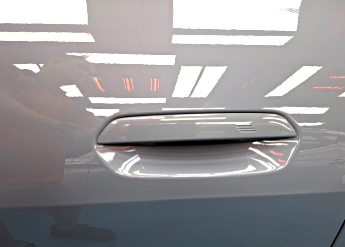 The coated paintwork of the BMW i4, clean and sharp.