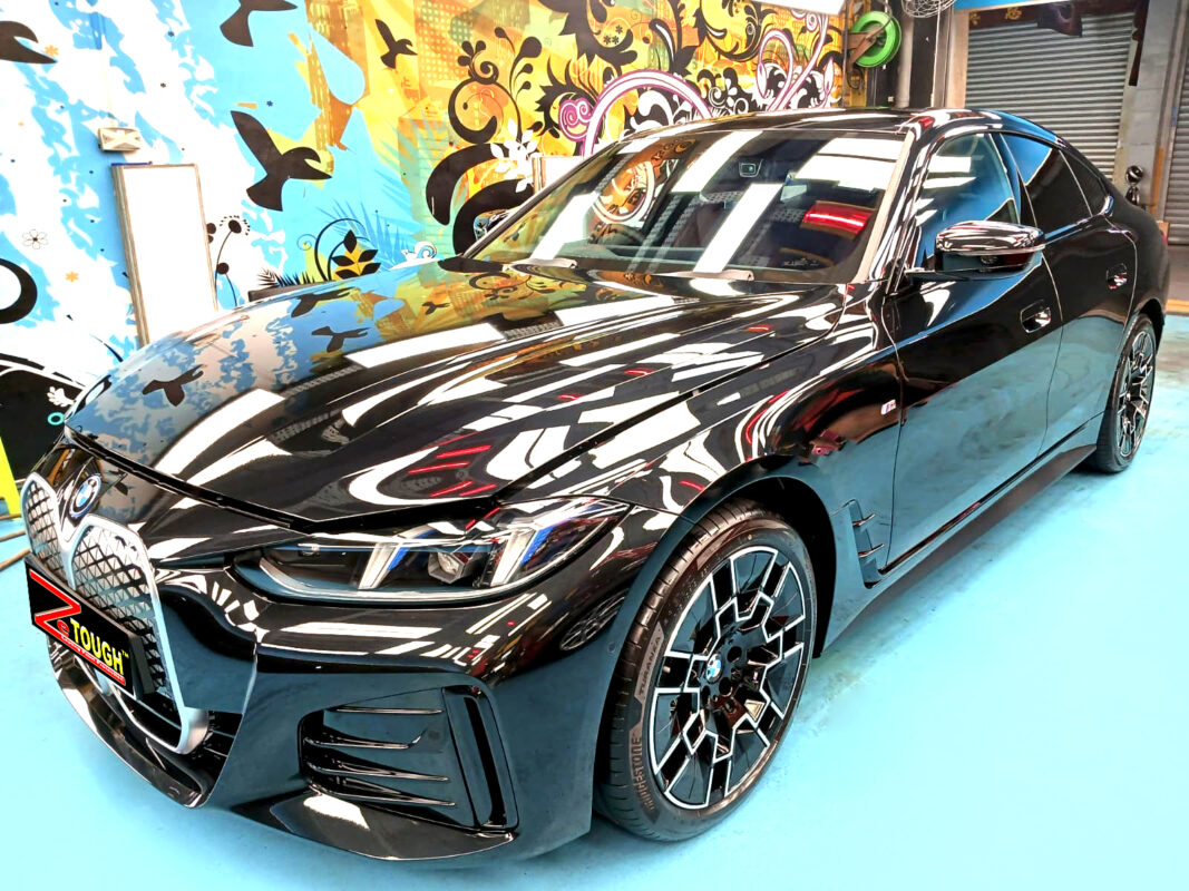 BMW i4, glossy after its ZeTough Titanium coating.