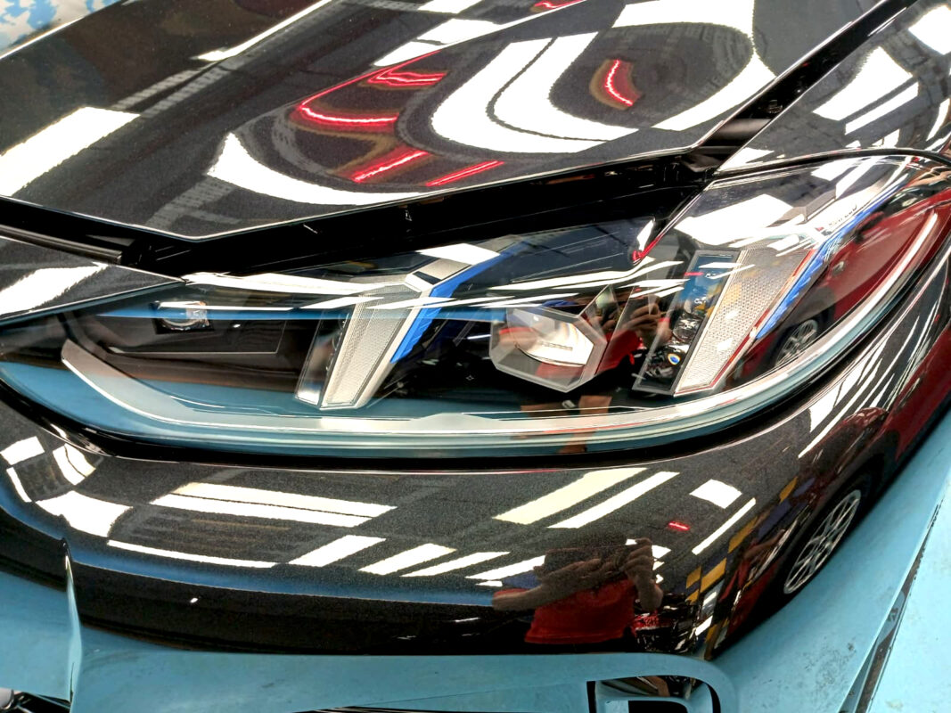 Glossy bodywork of the BMW i4 after coating.