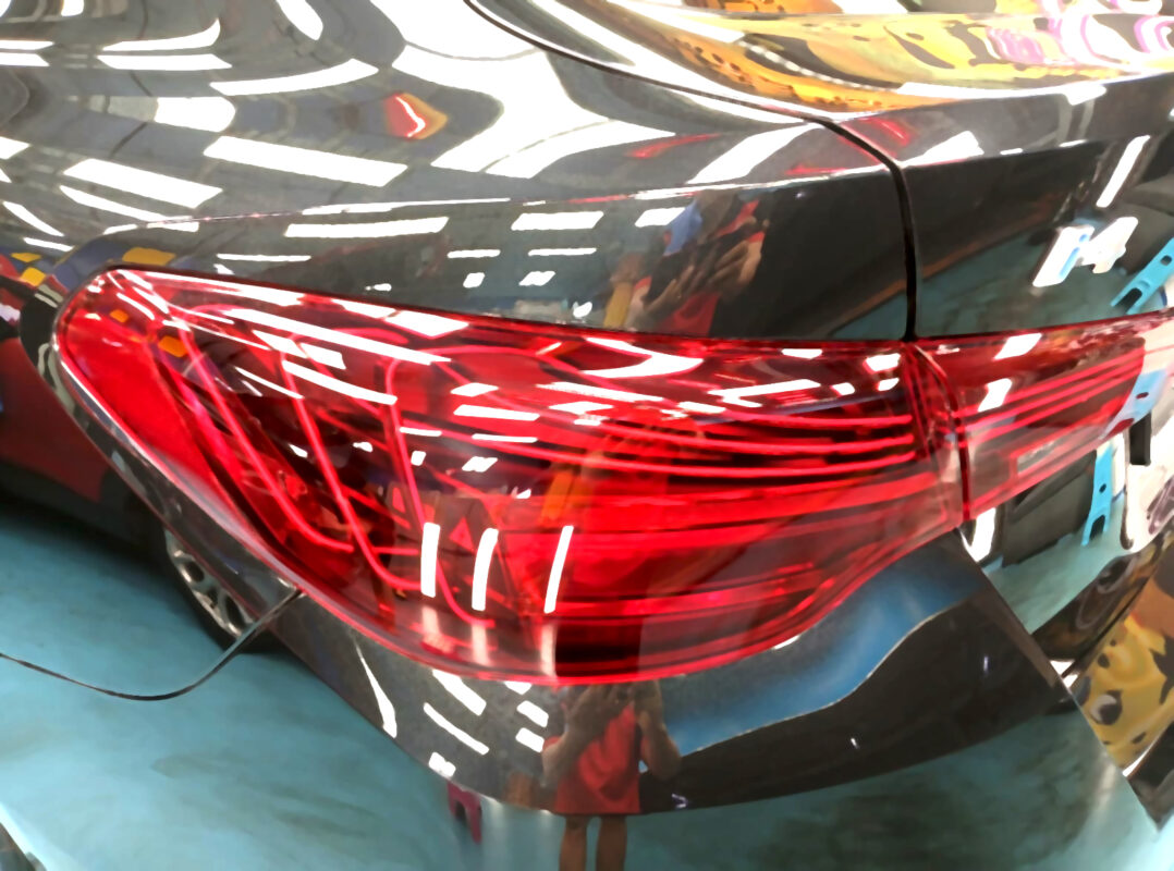 The finished BMW i4, glossy and protected.