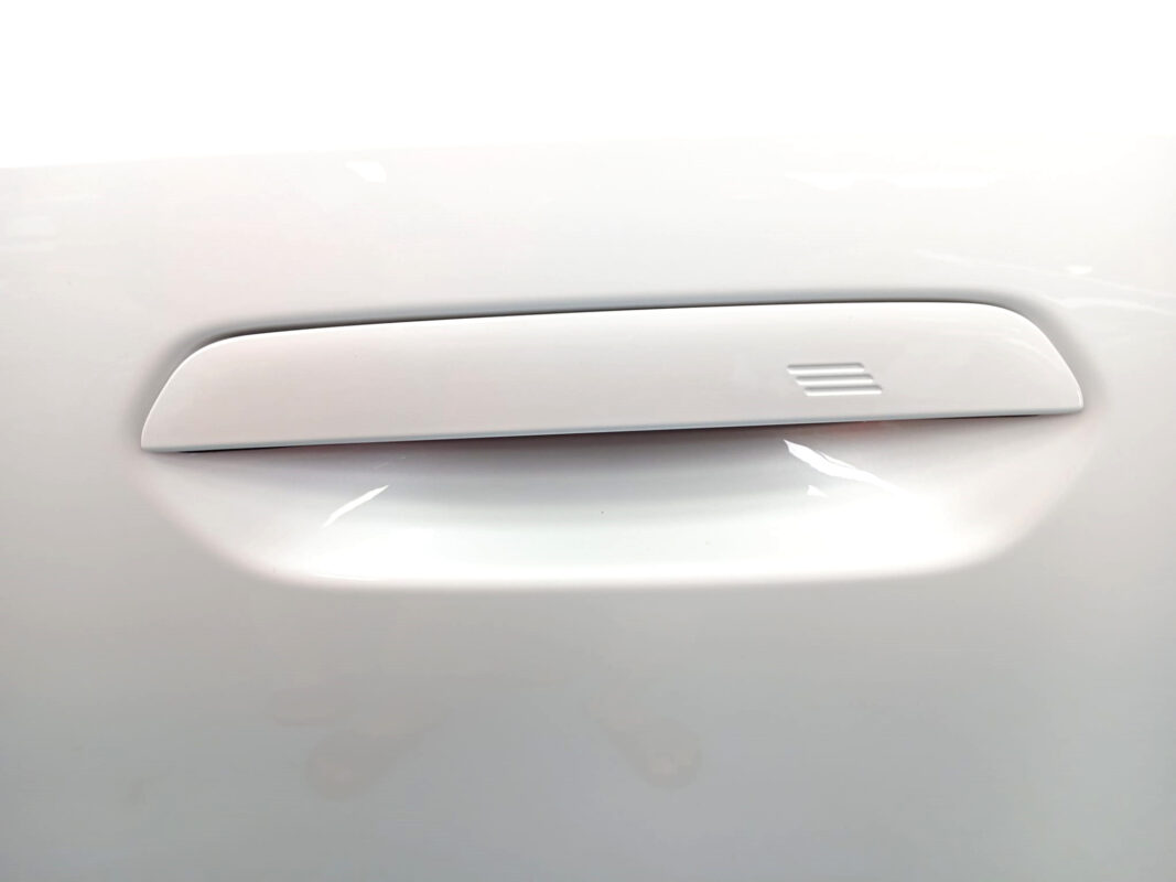 Side panel of the BMW i5 with the titanium finish locked in.