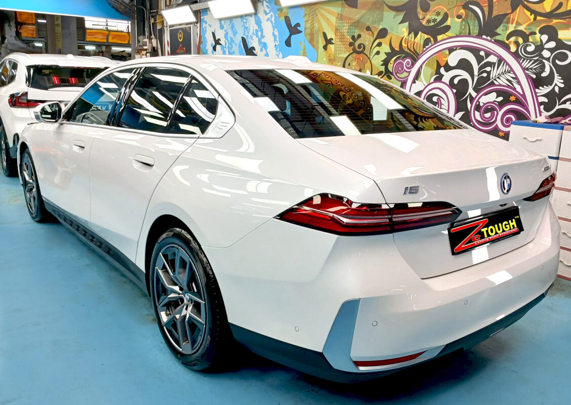 Front three-quarter view of the BMW i5 after coating.