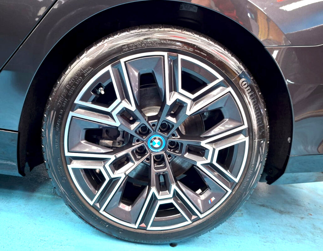 The BMW i5 with its fresh, coated finish.