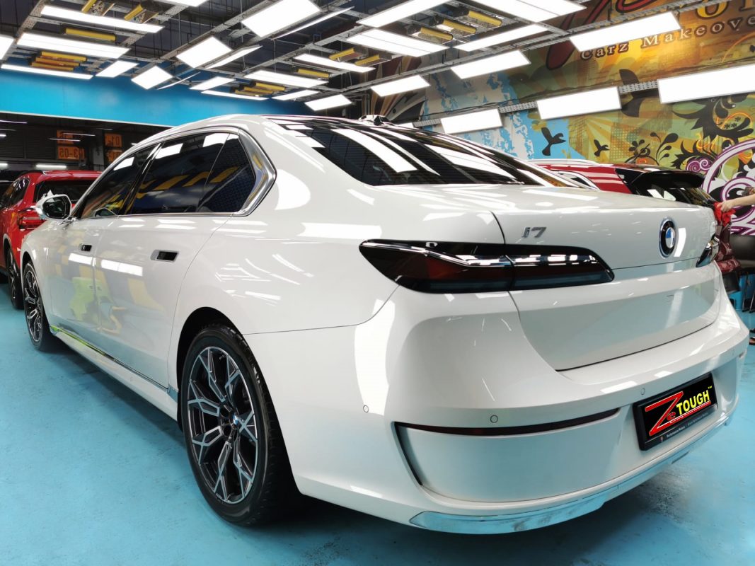 Rear quarter of the BMW i7, glossy and protected.