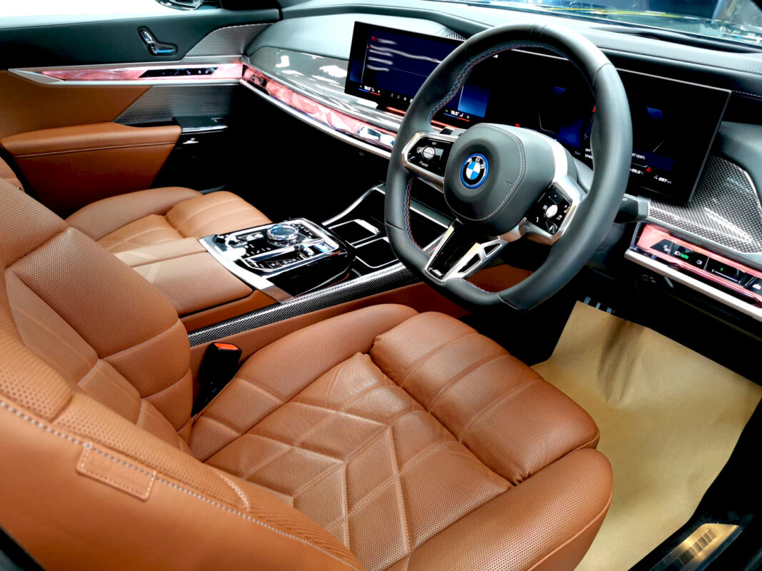 The BMW i7 parked in the workshop, freshly coated.