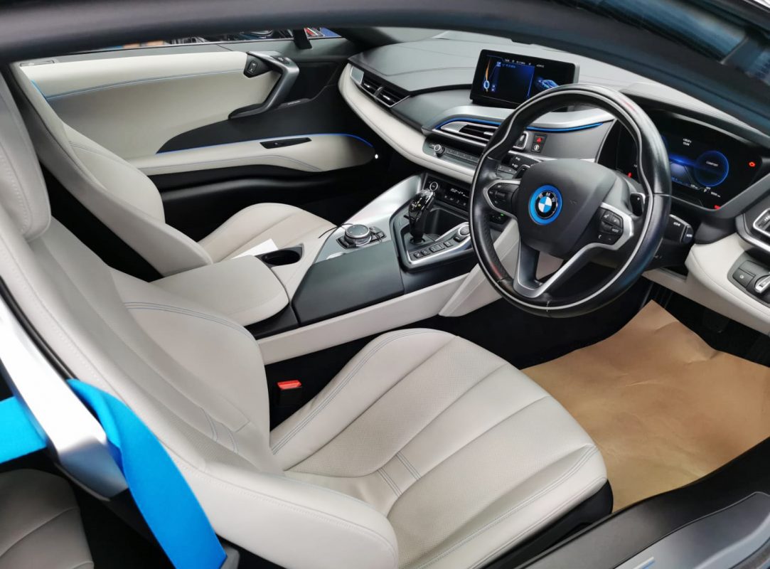 Rear quarter of the BMW i8, glossy and protected.