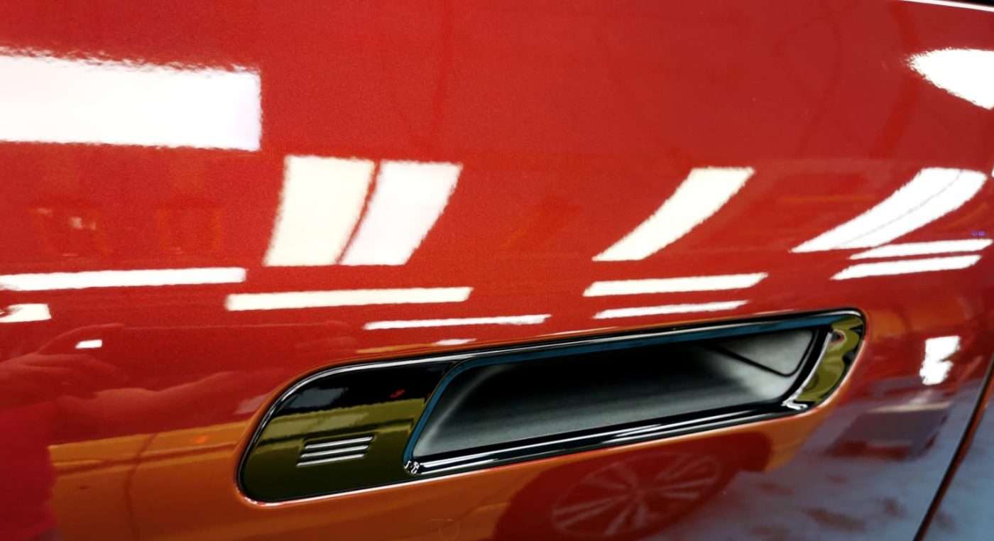Side panel of the BMW iX with the ceramic finish locked in.