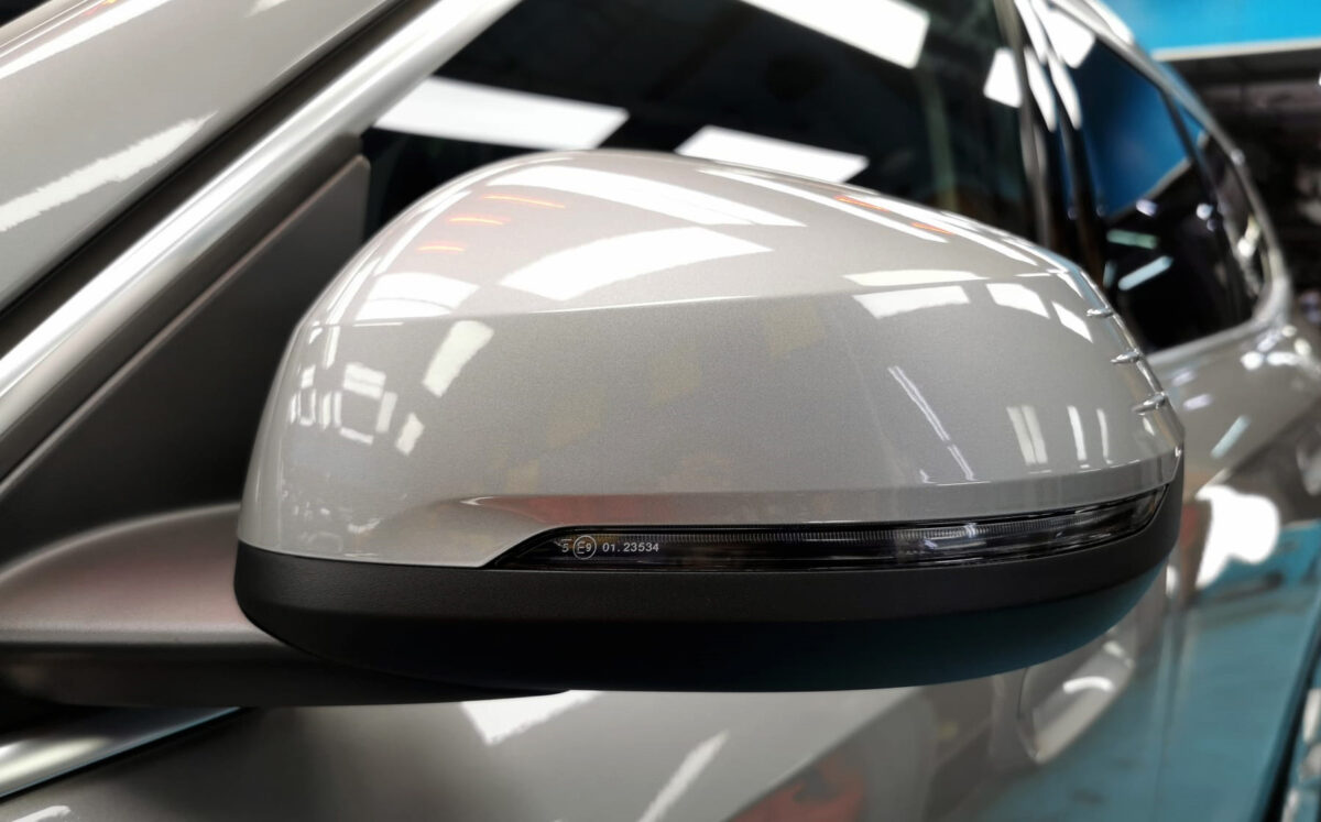 Side panel of the BMW iX1 with the ceramic finish locked in.