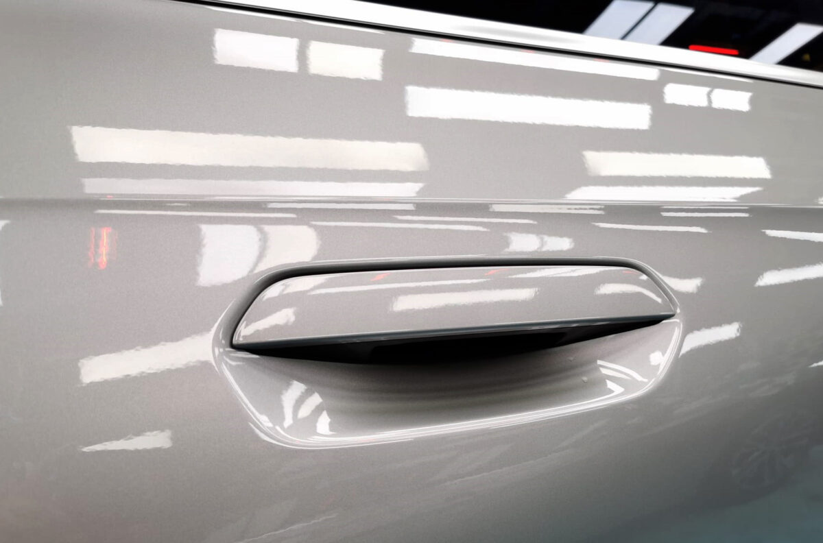 Front three-quarter view of the BMW iX1 after coating.