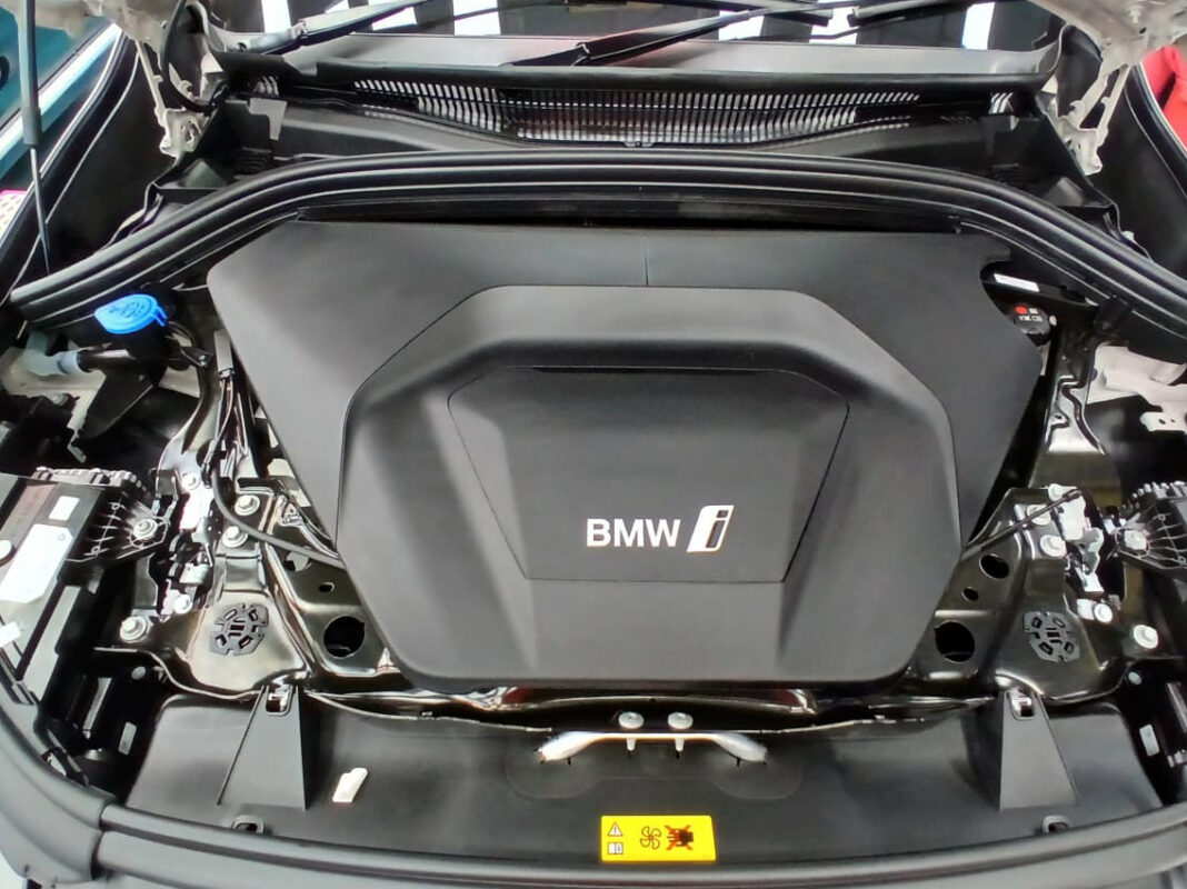 Front three-quarter view of the BMW iX1 after coating.