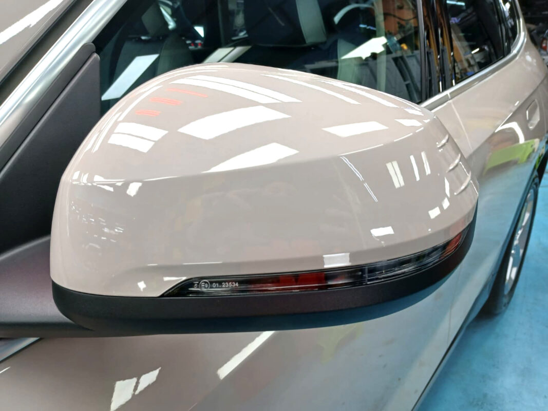 Side panel of the BMW iX1 with the ceramic finish locked in.