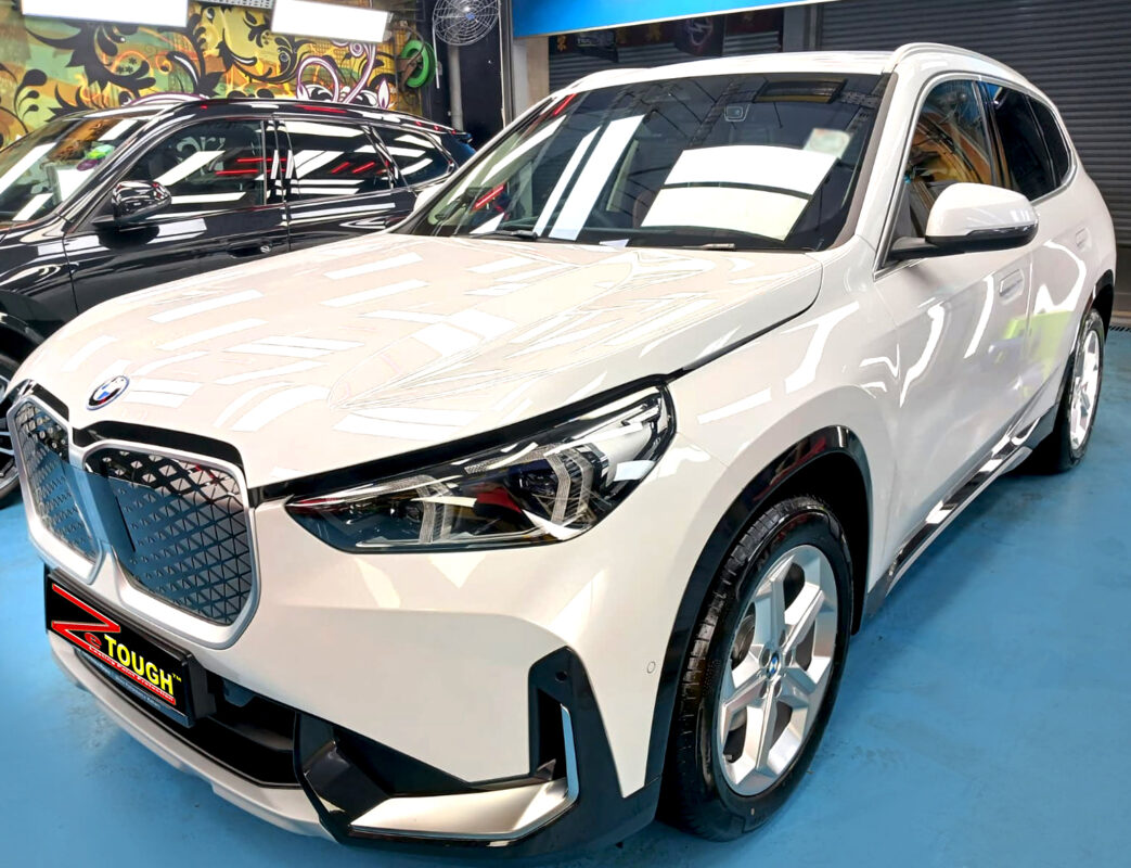 BMW iX1, glossy after its ZeTough Ceramic coating.