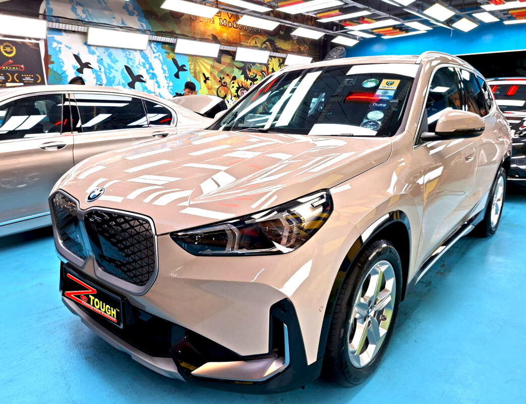 BMW iX1, glossy after its ZeTough Ceramic coating.