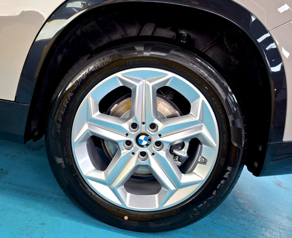 The BMW iX1 with its fresh, coated finish.