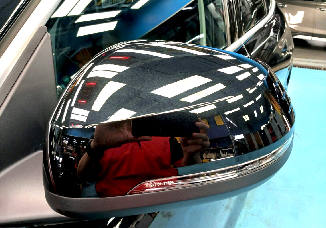 Side panel of the BMW iX1 with the titanium finish locked in.
