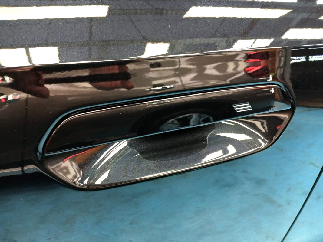 Front three-quarter view of the BMW iX1 after coating.