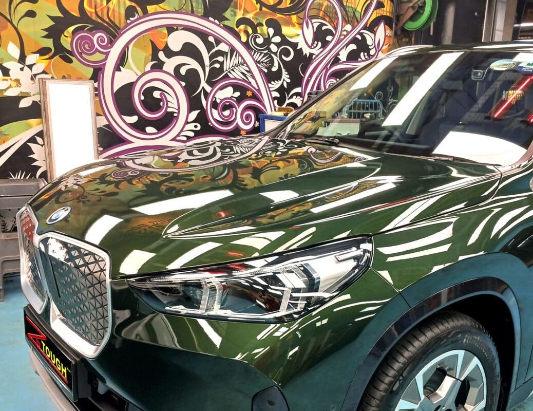The BMW iX1 from a side angle after the ceramic coating.