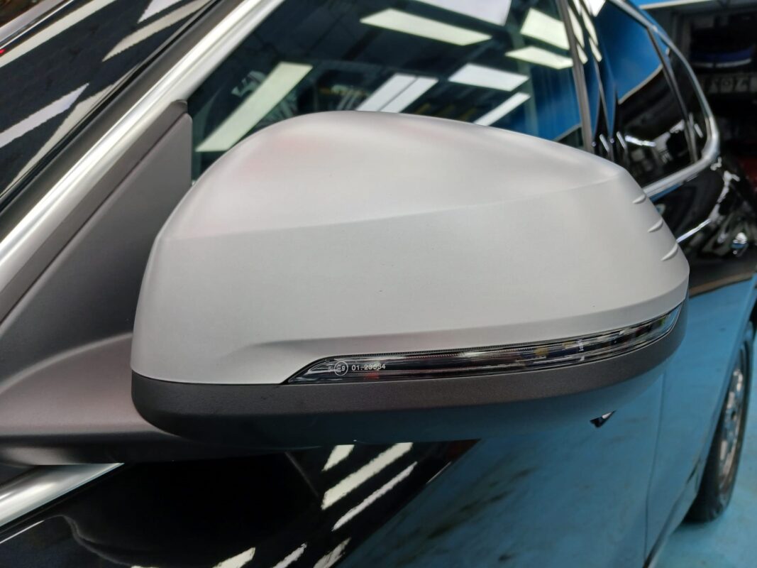 Side panel of the BMW iX1 with the ceramic finish locked in.