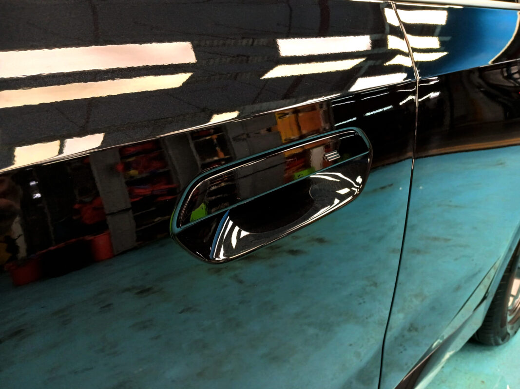 Front three-quarter view of the BMW iX1 after coating.