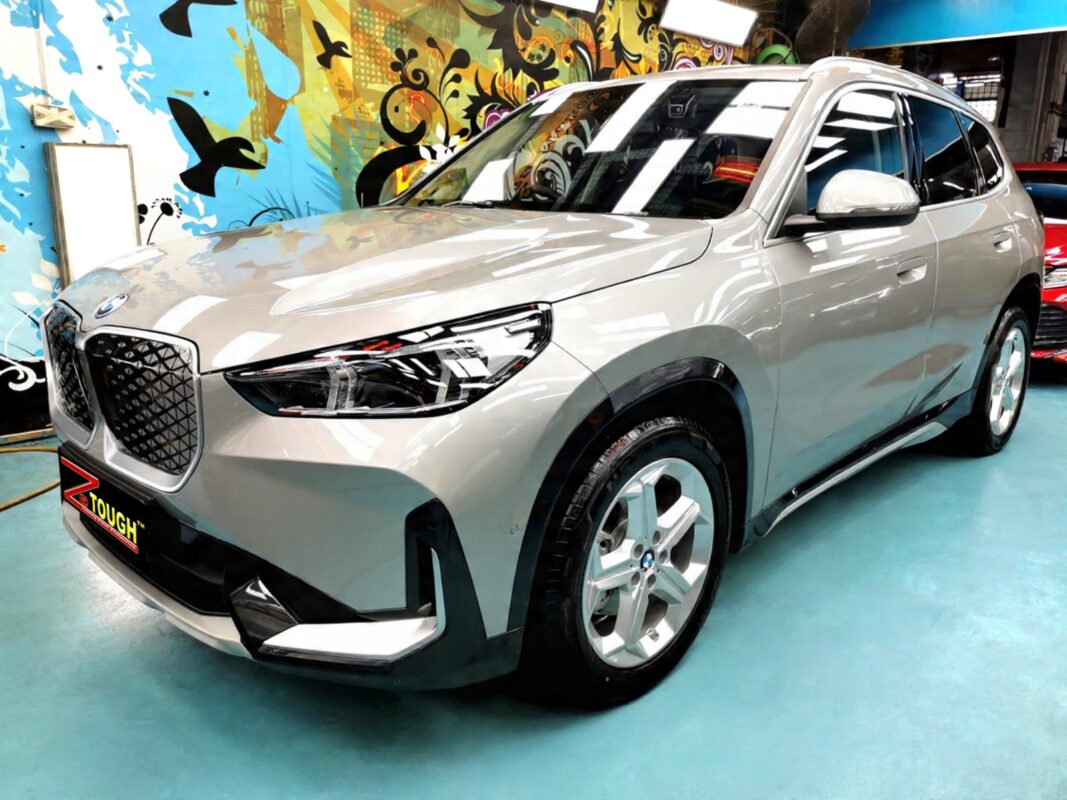 BMW iX1, glossy after its ZeTough Titanium coating.