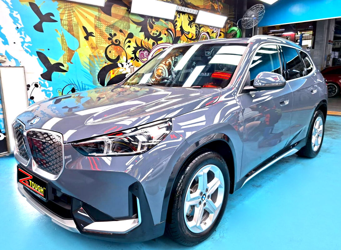 BMW iX1, glossy after its ZeTough Titanium coating.