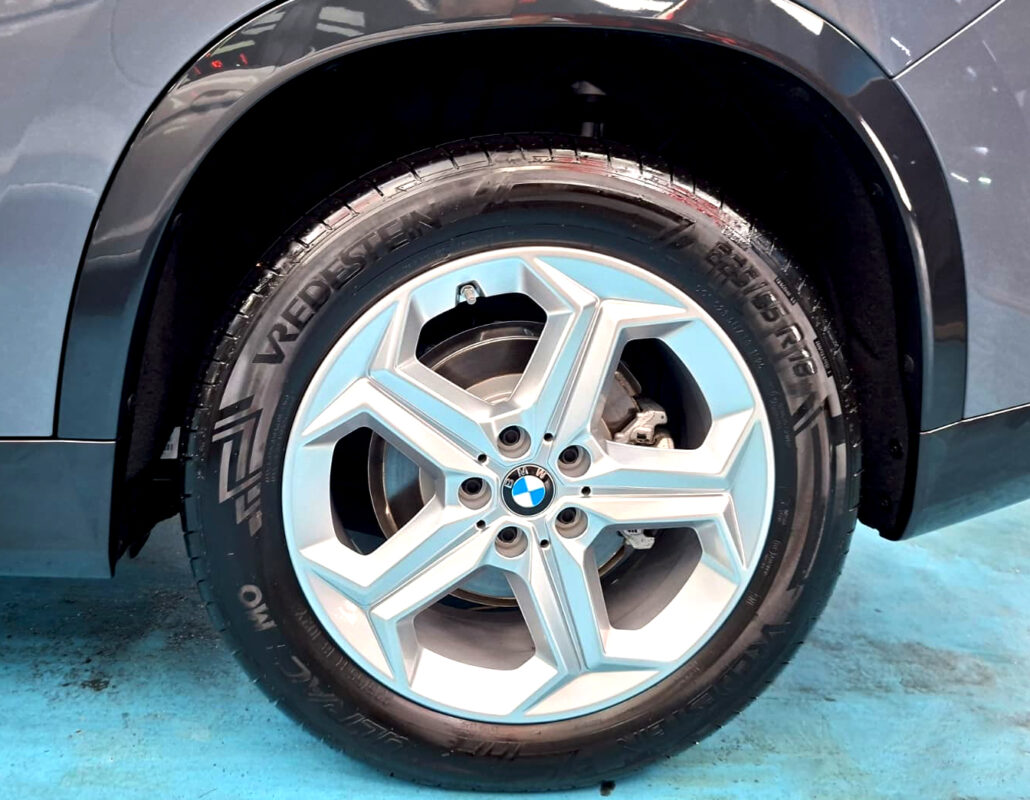 The BMW iX1 with its fresh, coated finish.