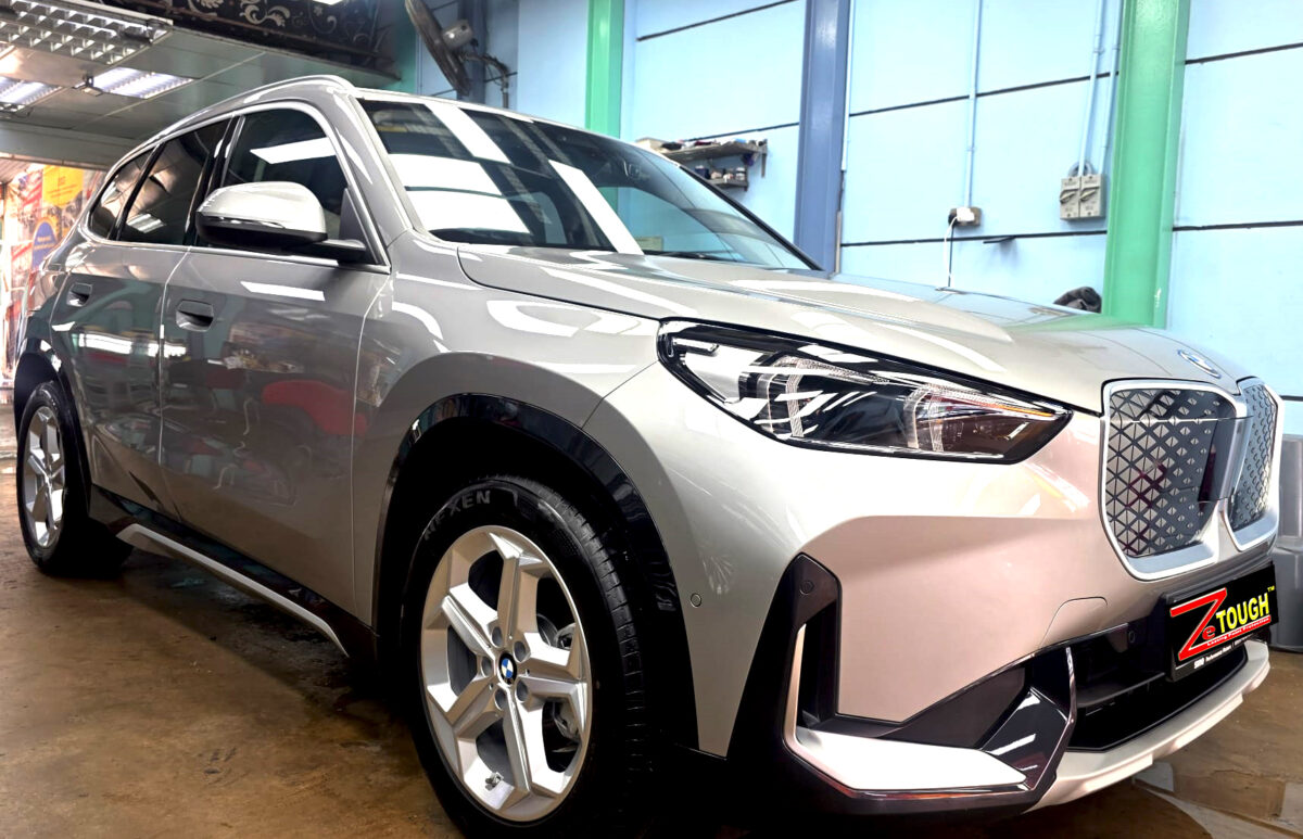BMW iX1, glossy after its ZeTough Titanium coating.