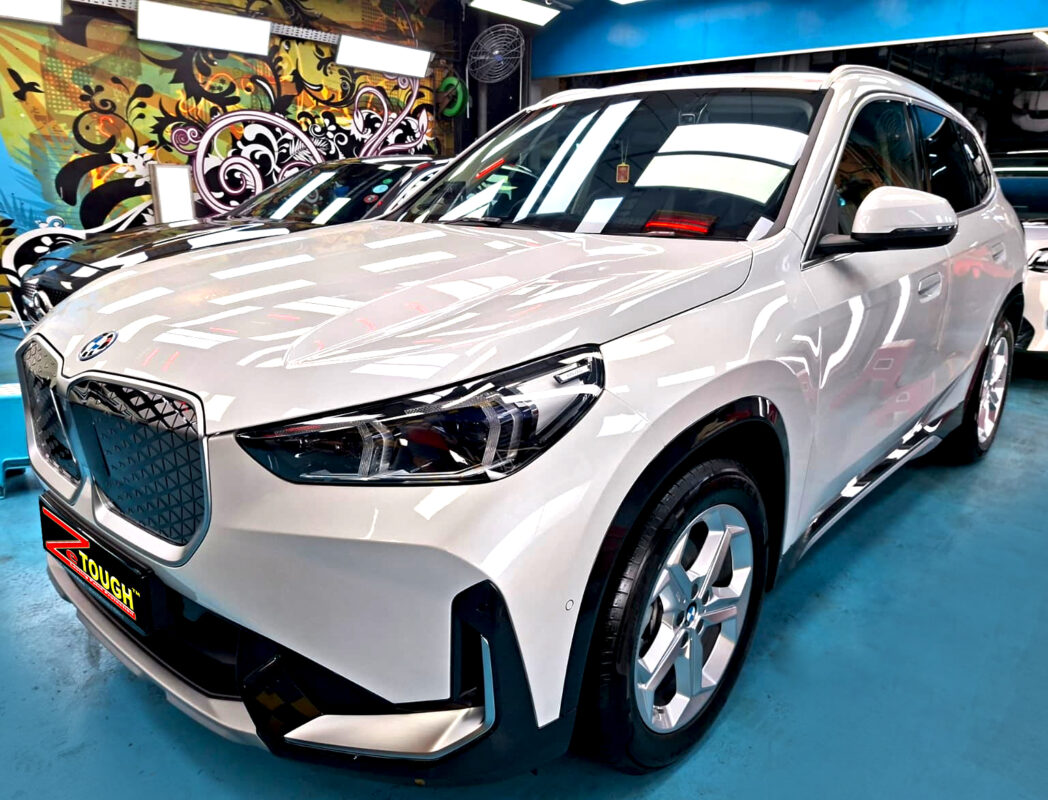 BMW iX1, glossy after its ZeTough Ceramic coating.
