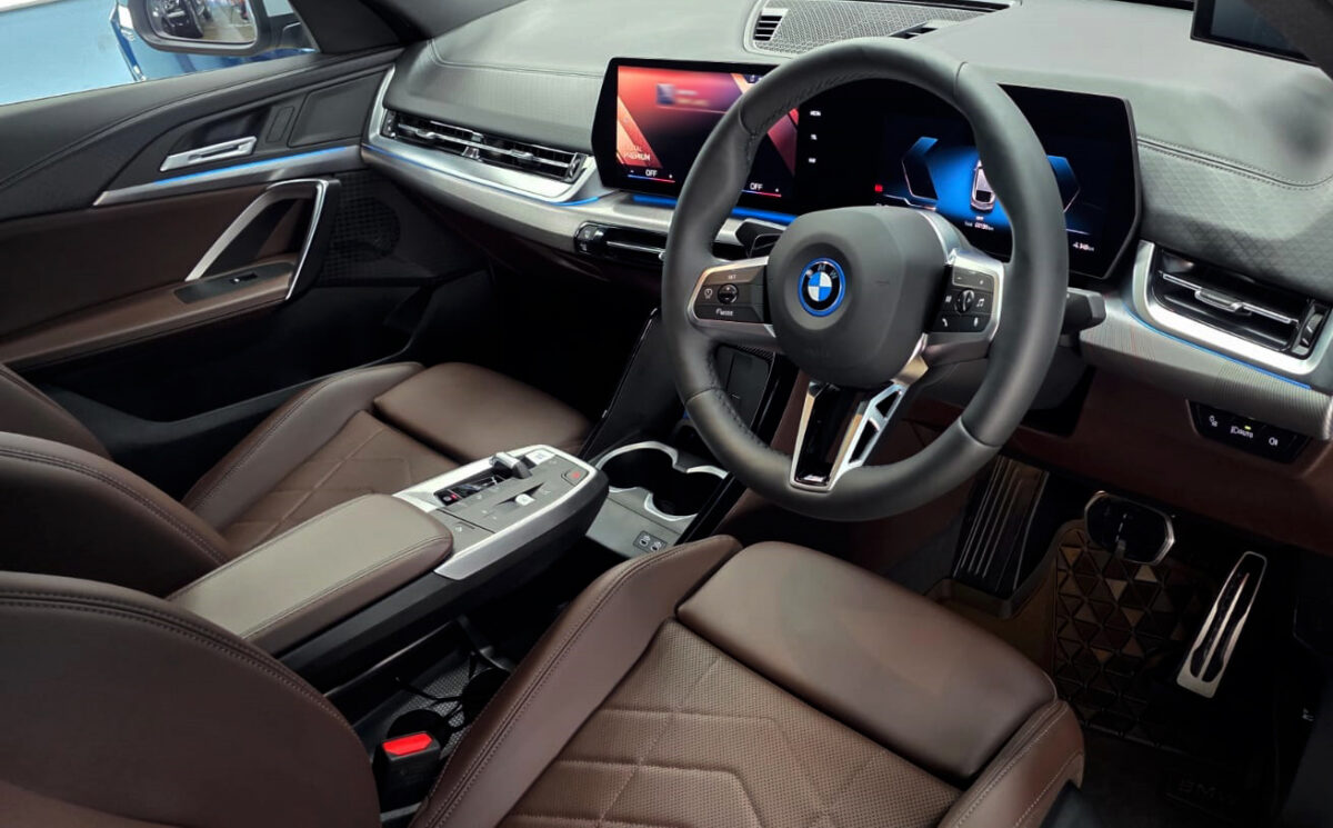 Detail of the BMW iX2's bodywork sealed with ZeTough Ceramic.