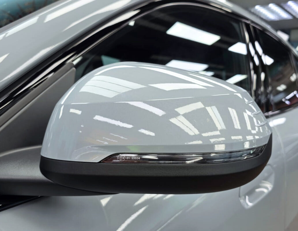 Side panel of the BMW iX2 with the ceramic finish locked in.