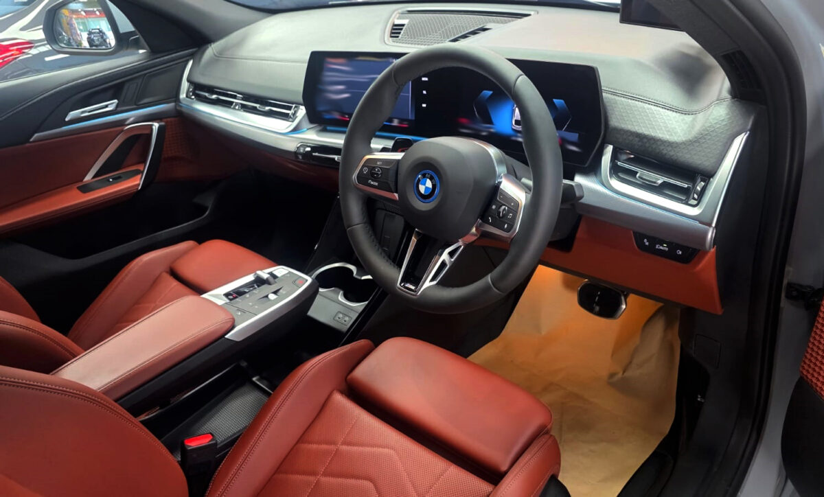 Front three-quarter view of the BMW iX2 after coating.
