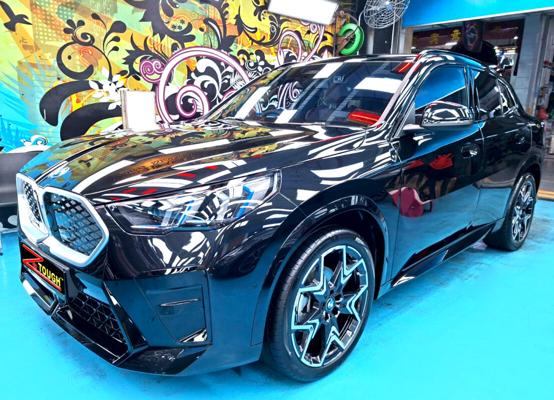 BMW iX2, glossy after its ZeTough Ceramic coating.