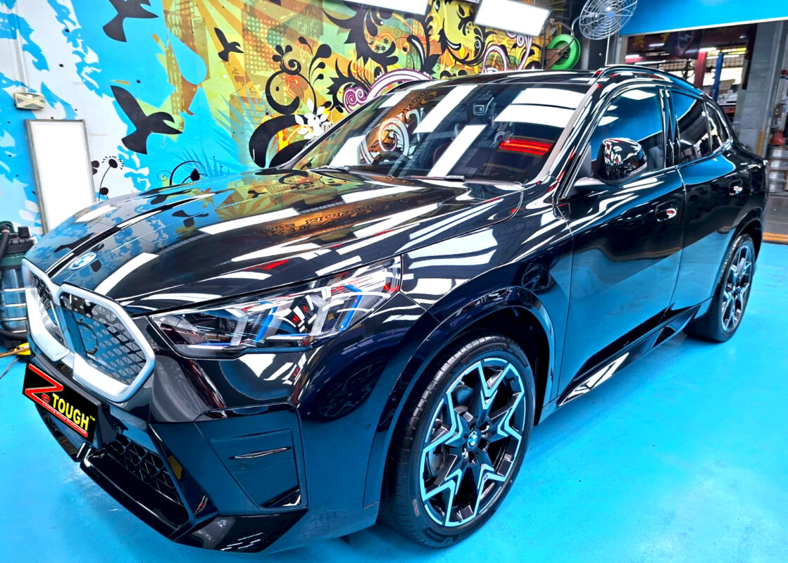 BMW iX2, glossy after its ZeTough Ceramic coating.