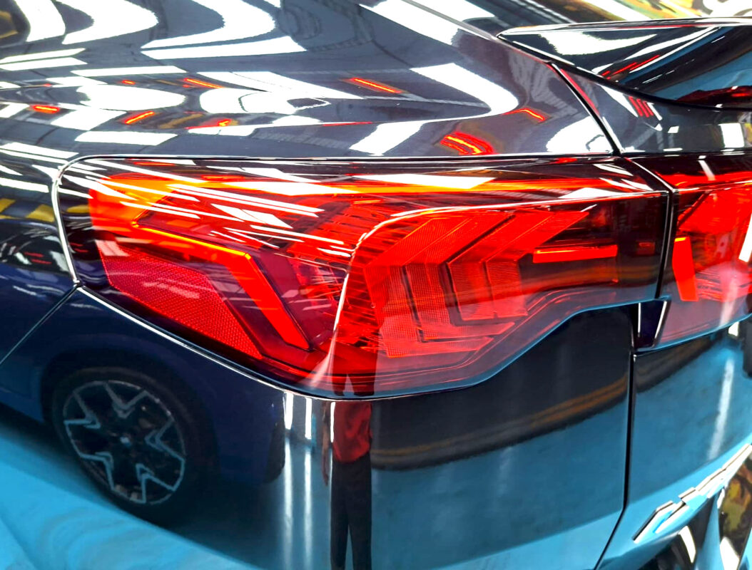 The finished BMW iX2, glossy and protected.