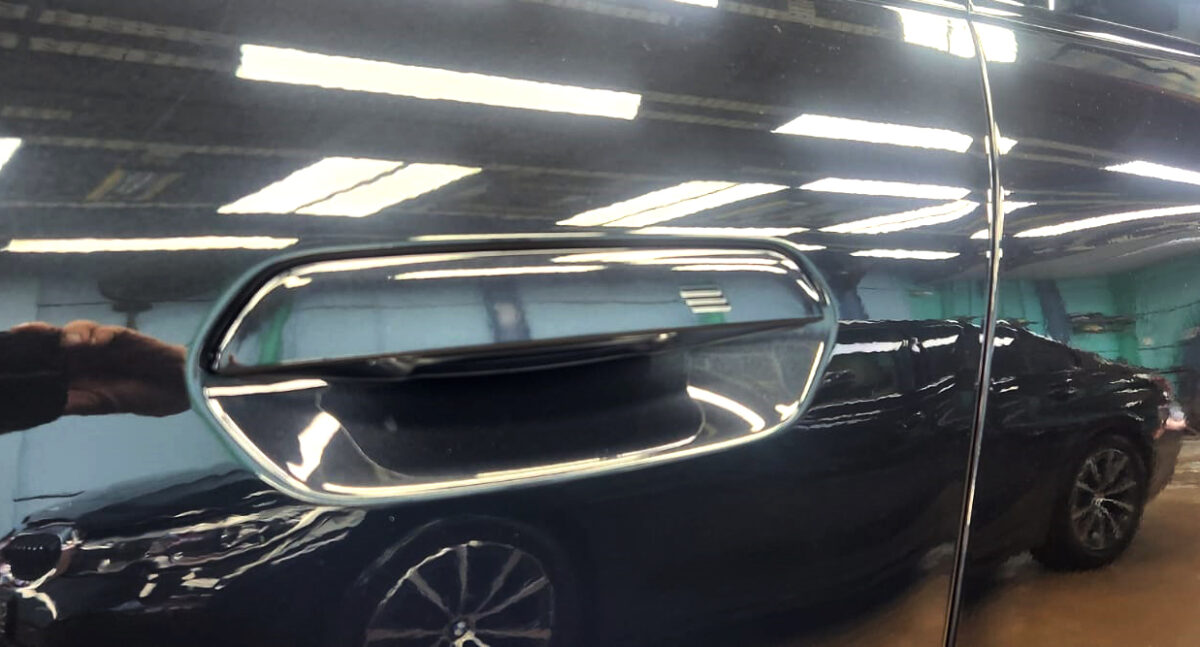 Front three-quarter view of the BMW iX2 after coating.