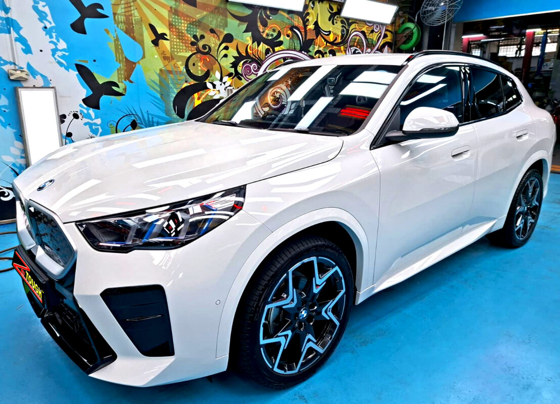 BMW iX2, glossy after its ZeTough Titanium coating.