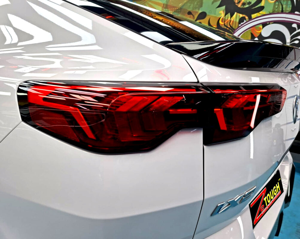 The finished BMW iX2, glossy and protected.
