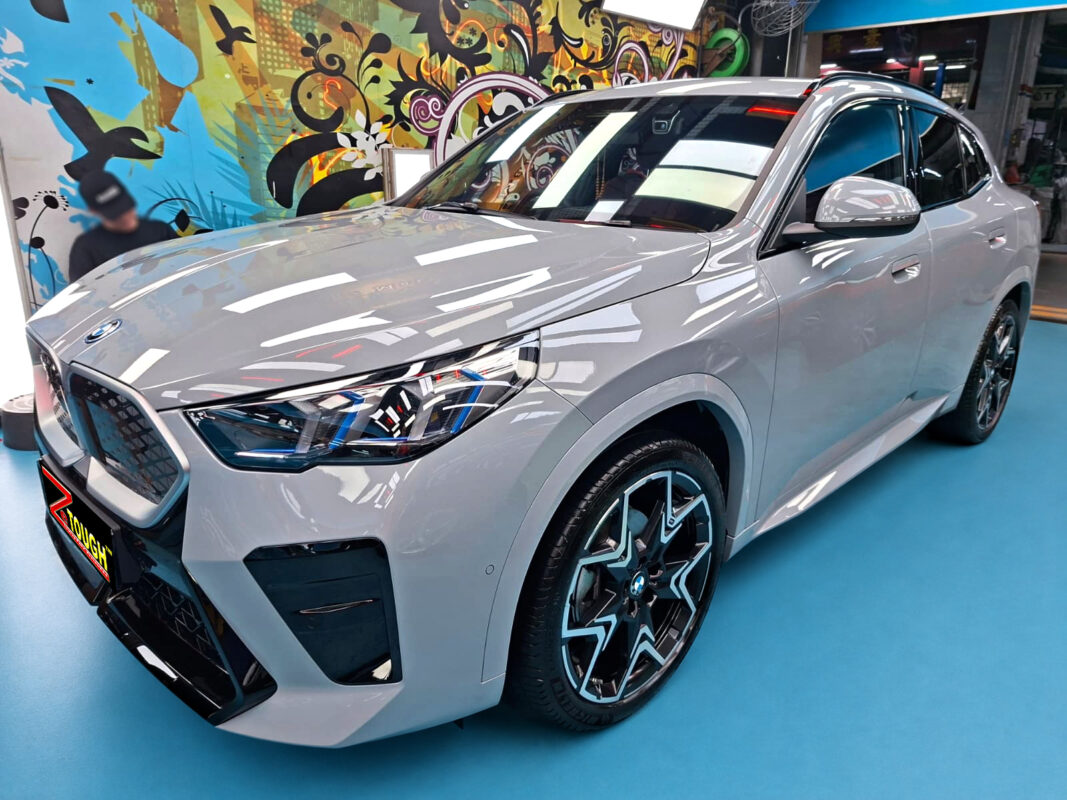 BMW iX2, glossy after its ZeTough Ceramic coating.