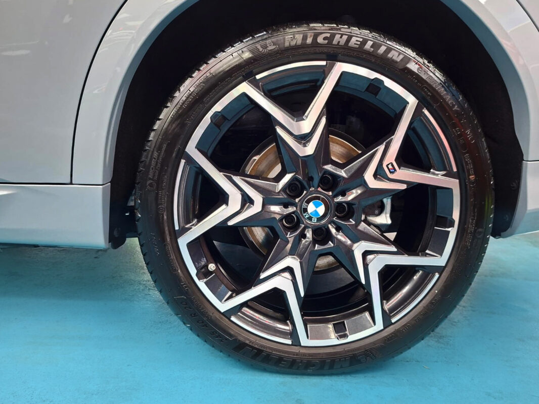 The finished BMW iX2, glossy and protected.