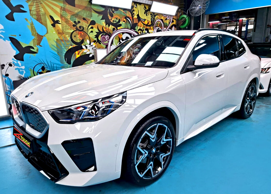 BMW iX2, glossy after its ZeTough Titanium coating.