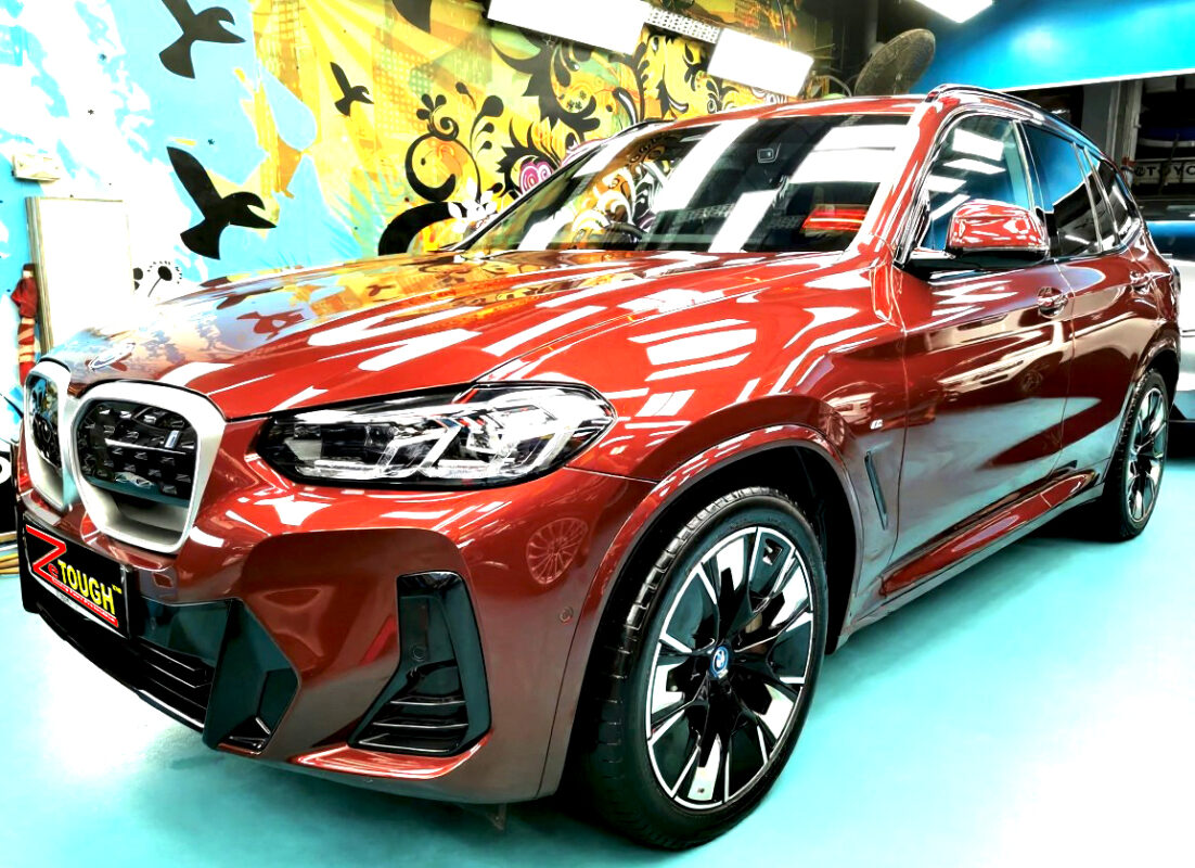 BMW iX3, glossy after its ZeTough Ceramic coating.
