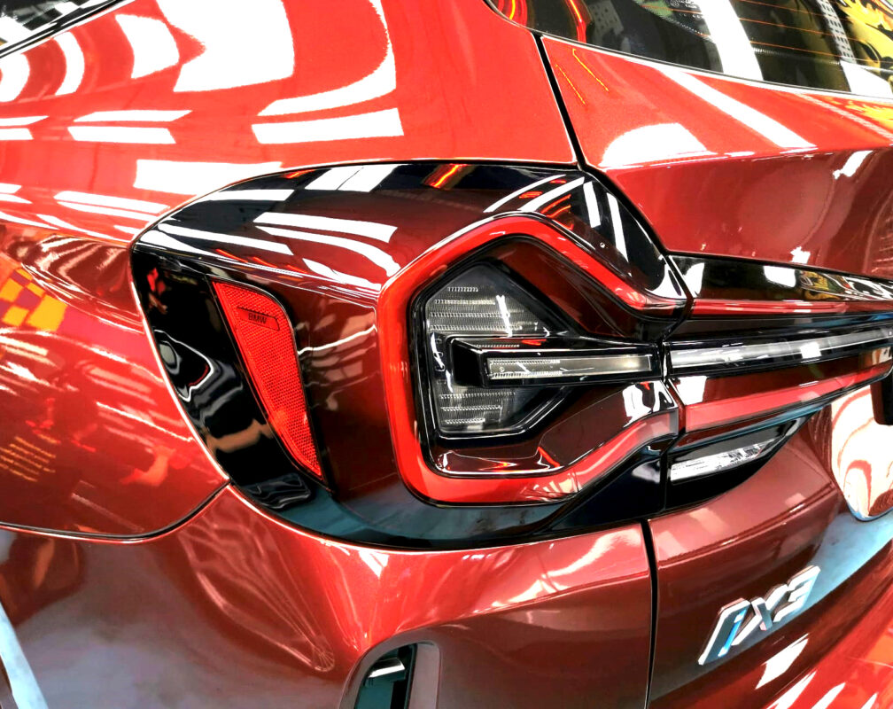 The finished BMW iX3, glossy and protected.