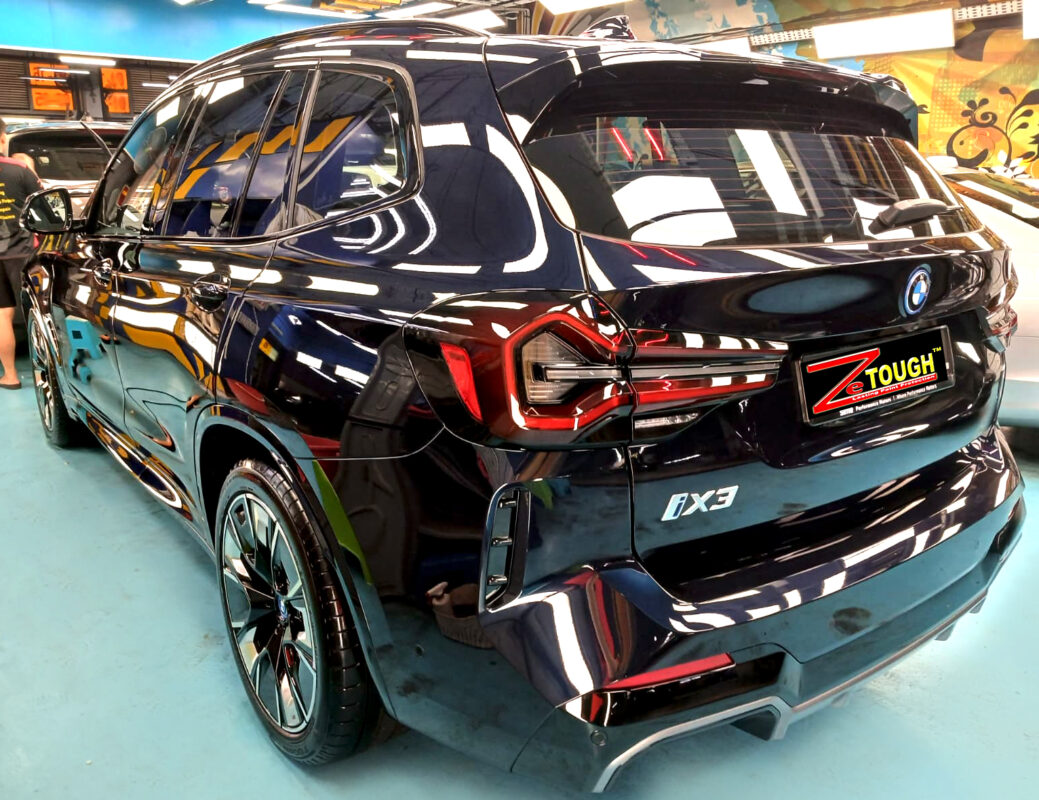 Front three-quarter view of the BMW iX3 after coating.