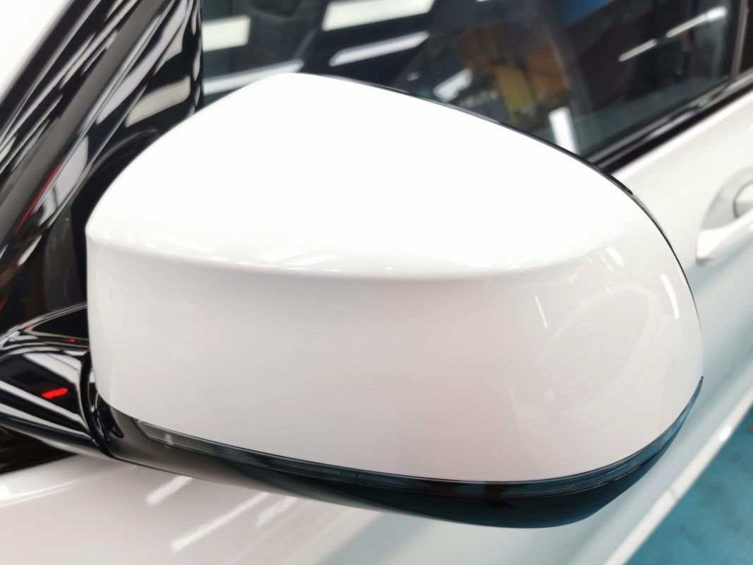Side panel of the BMW iX3 with the titanium finish locked in.