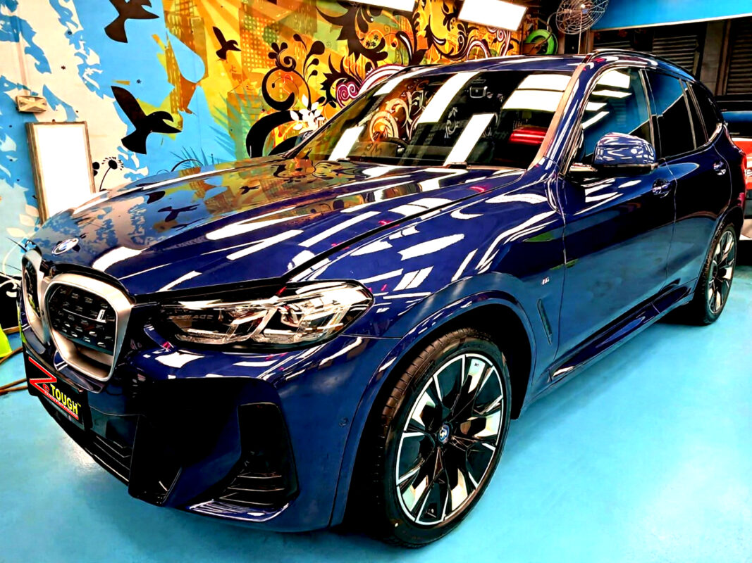 BMW iX3, glossy after its ZeTough Ceramic coating.