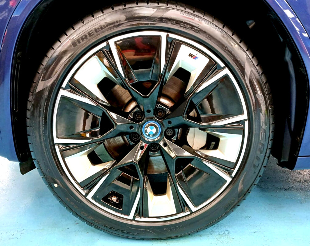 The finished BMW iX3, glossy and protected.