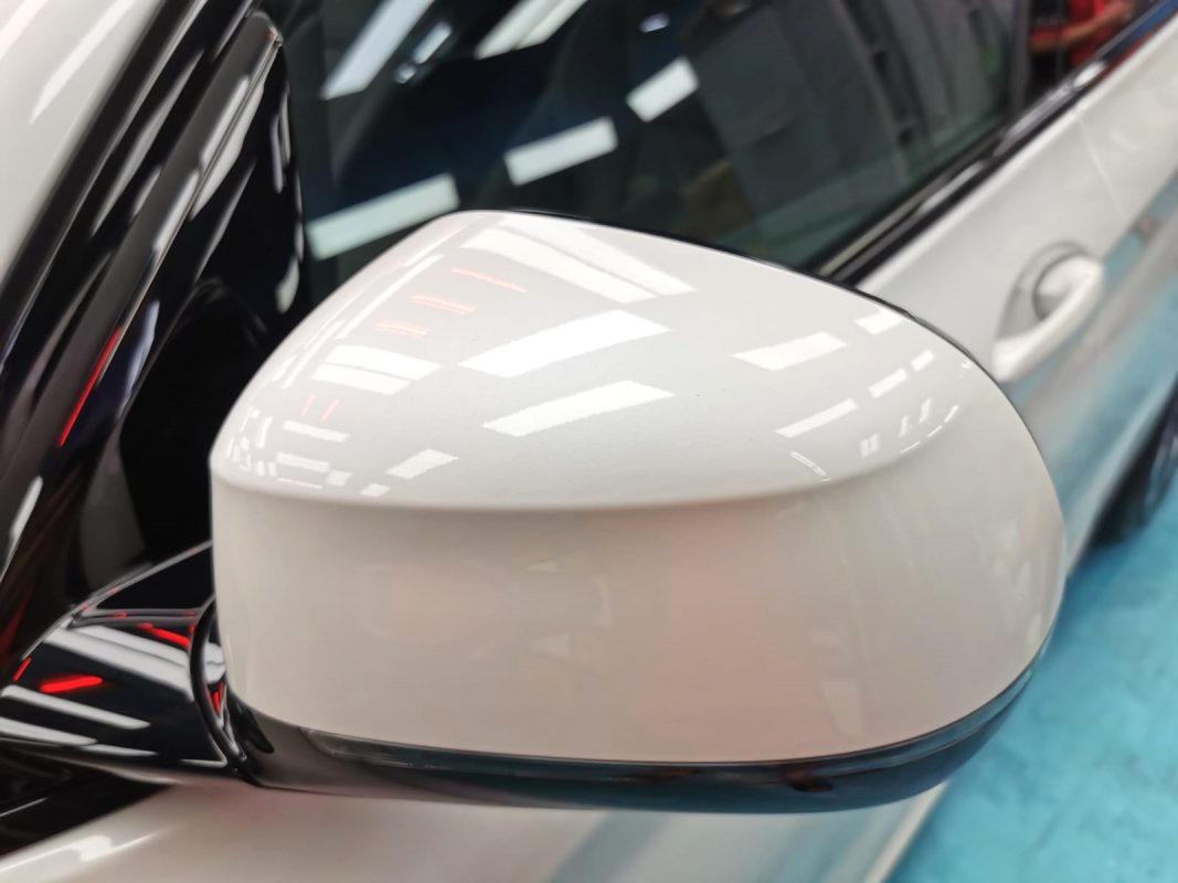Side panel of the BMW iX3 with the titanium finish locked in.